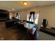 Spacious living room featuring a fireplace and dark wood floors at 6628 Heben Ct, Indianapolis, IN 46113