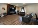 Living room with fireplace and dark wood floors at 6628 Heben Ct, Indianapolis, IN 46113