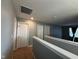 Upper hallway with gray walls and carpet flooring at 6628 Heben Ct, Indianapolis, IN 46113