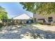 Spacious backyard patio with a wooden fence, perfect for outdoor gatherings at 7129 Dublin Ln, Indianapolis, IN 46239
