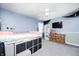 Bedroom featuring a trundle bed, a ceiling fan, and a TV on top of a dresser at 7129 Dublin Ln, Indianapolis, IN 46239