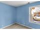 Blue bedroom with window and carpet at 7620 Baywood S Dr, Indianapolis, IN 46236