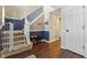 Carpeted staircase with a white railing and blue accent wall at 7746 Cole Wood Blvd, Indianapolis, IN 46239