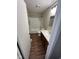 Updated bathroom with walk-in shower and dark wood vanity at 835 E Berwyn St, Indianapolis, IN 46203