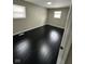 Bright bedroom with dark hardwood floors and neutral walls at 835 E Berwyn St, Indianapolis, IN 46203
