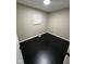 Bright bedroom with dark hardwood floors and spacious closet at 835 E Berwyn St, Indianapolis, IN 46203