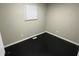 Neutral bedroom with a black hardwood floors, a single window, and white baseboard trim at 835 E Berwyn St, Indianapolis, IN 46203