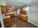 Kitchen features wood cabinets, light countertops, and a built-in hutch at 835 E Berwyn St, Indianapolis, IN 46203