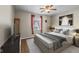 Spacious bedroom with a king-size bed, large window, and modern decor at 8796 W 800 S, Pendleton, IN 46064