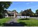 Three-car garage and charming front porch at 930 River Rd, Columbus, IN 47203