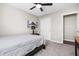 Primary bedroom with ceiling fan and sliding door closet at 943 Aurora Ln, Franklin, IN 46131