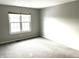 Bright bedroom with neutral walls and carpet flooring at 9518 Bay Vista E Dr, Indianapolis, IN 46250