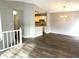 Open dining area with hardwood floors and kitchen views at 9518 Bay Vista E Dr, Indianapolis, IN 46250