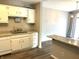 Updated kitchen with white cabinets and granite countertops at 9518 Bay Vista E Dr, Indianapolis, IN 46250