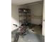 Storage area with shelving unit and space for bikes at 9518 Bay Vista E Dr, Indianapolis, IN 46250