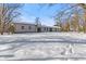 Backyard view of house with snow on the ground at 9791 N Gasburg Rd, Mooresville, IN 46158