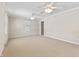 Primary bedroom with ceiling fans and walk-in closet at 9791 N Gasburg Rd, Mooresville, IN 46158