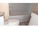 Bathroom with bathtub and toilet at 1052 N Mount St, Indianapolis, IN 46222