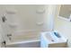 Clean bathroom with a bathtub, shower, and sink, ideal for a simple and functional space at 1052 N Mount St, Indianapolis, IN 46222