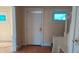 Front entry with hardwood floors and staircase at 1052 N Mount St, Indianapolis, IN 46222