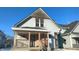 Charming two-story home with a front porch at 1052 N Mount St, Indianapolis, IN 46222