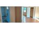 Hallway view of kitchen and bedroom at 1052 N Mount St, Indianapolis, IN 46222