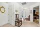 Spacious entryway with hardwood floors and coat closet at 11537 Jagged Rock Ct, Fishers, IN 46037