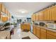 Modern kitchen with a long island and stainless steel appliances at 11537 Jagged Rock Ct, Fishers, IN 46037