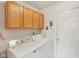 Laundry room with washer, dryer, and cabinets at 11537 Jagged Rock Ct, Fishers, IN 46037