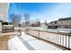 Wooden deck overlooking a snowy backyard at 1519 Tulip Dr, Franklin, IN 46131