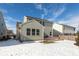 Exterior view of home and backyard in winter at 15256 Harmon Pl, Noblesville, IN 46060