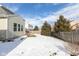Yard with snow, wooden fence, and home exterior at 15256 Harmon Pl, Noblesville, IN 46060