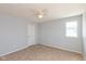 Simple bedroom with carpeted floor and ceiling fan at 15256 Harmon Pl, Noblesville, IN 46060