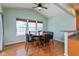 Dining area with a wood table, four chairs, and access to a deck at 15256 Harmon Pl, Noblesville, IN 46060