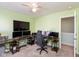 Home office featuring a large desk and triple monitors at 15256 Harmon Pl, Noblesville, IN 46060