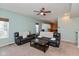 Open living area with leather couches and a coffee table at 15256 Harmon Pl, Noblesville, IN 46060