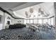 Bright dining area with many tables and chairs, and a large window at 15744 Bethpage Trl, Carmel, IN 46033