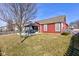 Spacious backyard featuring a covered patio with outdoor seating, perfect for relaxation at 15759 Hargray Dr, Noblesville, IN 46062