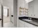 Bathroom featuring granite counters, a vanity, and ceramic tile floors at 15759 Hargray Dr, Noblesville, IN 46062