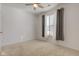 Bright bedroom featuring neutral walls, carpet, and gray curtains at 15759 Hargray Dr, Noblesville, IN 46062