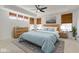 Cozy bedroom featuring light blue accents, woven textures, and a tray ceiling at 15759 Hargray Dr, Noblesville, IN 46062