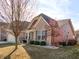 Attractive home with brick and siding, complemented by mature landscaping and blue shutters at 15759 Hargray Dr, Noblesville, IN 46062