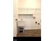 Functional laundry room with a utility sink and ample shelving space at 15759 Hargray Dr, Noblesville, IN 46062