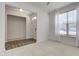 Neutral living room featuring wood floors, white walls, and a large window at 15759 Hargray Dr, Noblesville, IN 46062