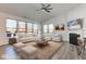 Bright and airy living room with vaulted ceiling, large windows, and neutral decor at 15759 Hargray Dr, Noblesville, IN 46062