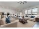Open-concept living room showcases seamless flow into the kitchen and dining area at 15759 Hargray Dr, Noblesville, IN 46062