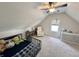 Bright bedroom with vaulted ceiling, plush carpeting, and ample natural light at 1604 Hoyt Ave, Indianapolis, IN 46203