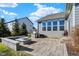 Backyard patio with a built-in grill and fire pit, perfect for outdoor gatherings at 19226 English Lake Ln, Noblesville, IN 46062