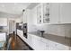 Modern kitchen with stainless appliances, white cabinets and subway tile at 19226 English Lake Ln, Noblesville, IN 46062