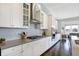 Modern kitchen with stainless steel appliances, sleek countertops, and white cabinetry at 19226 English Lake Ln, Noblesville, IN 46062